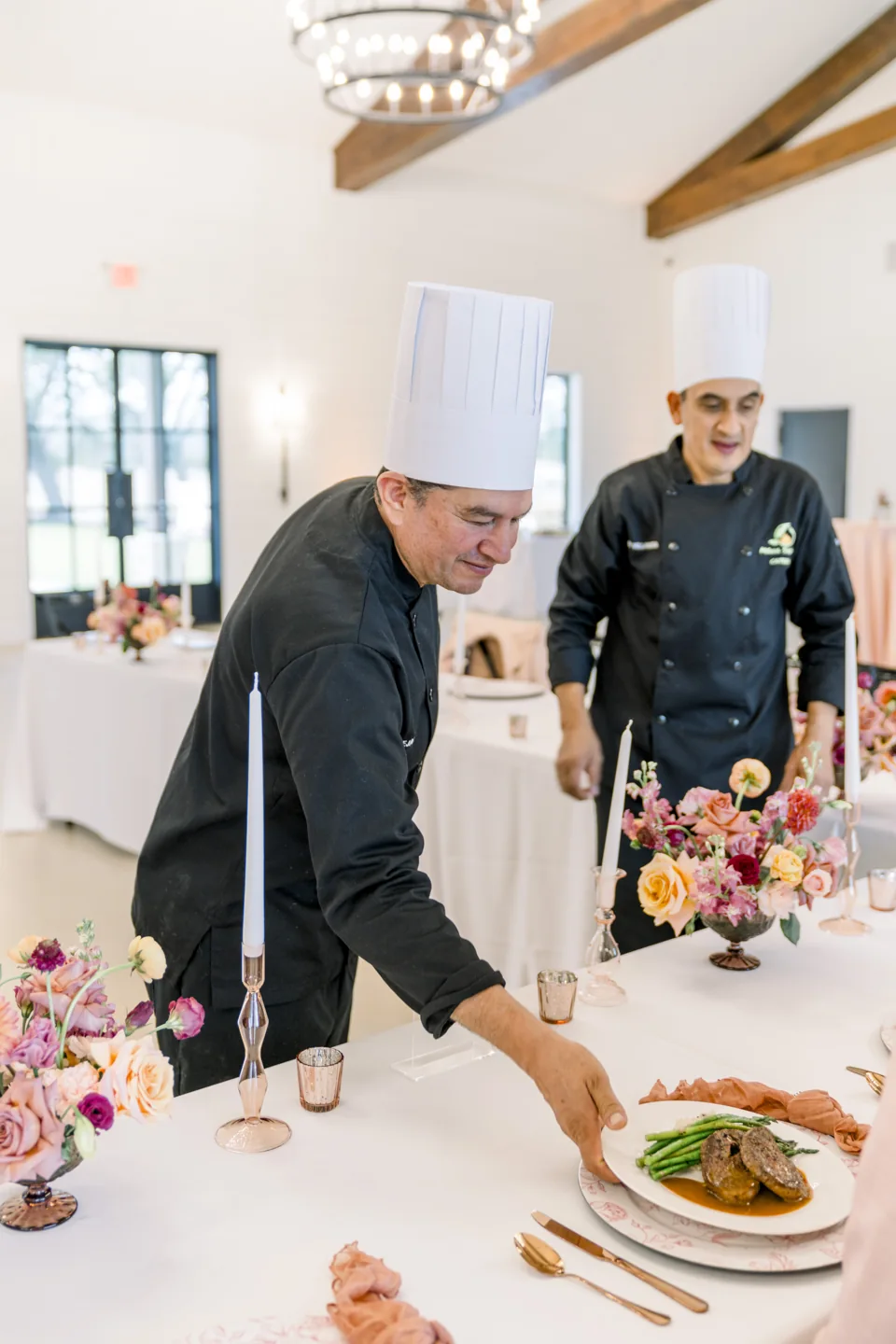 Mana Sabroso chefs finishing plates at a wedding